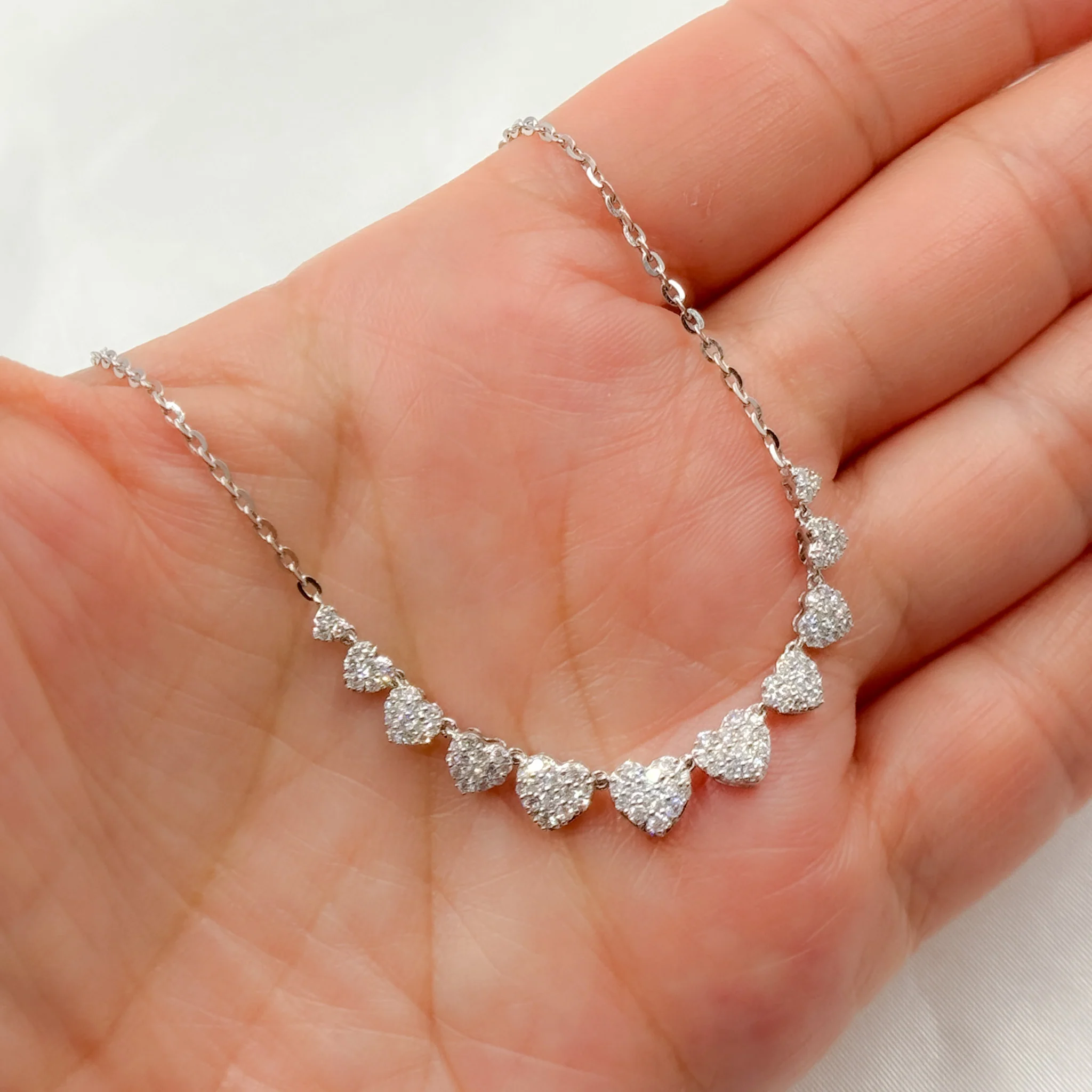 NK401349. 14K Solid Gold Diamond Hearts Necklace