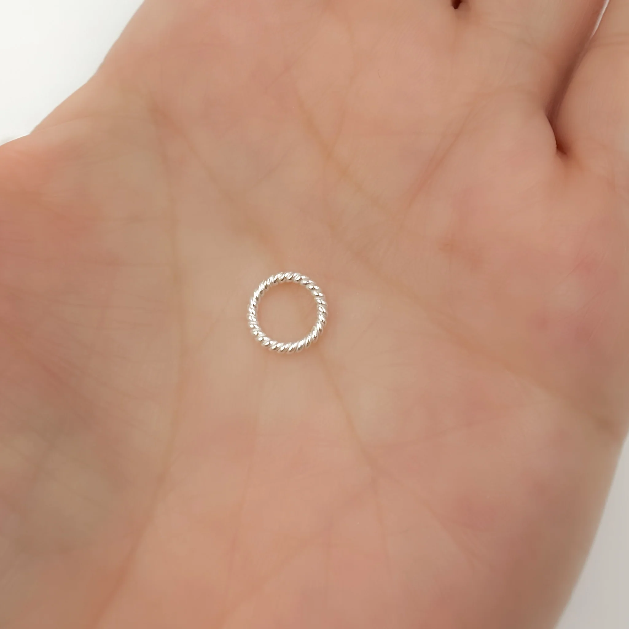 5004487CT. 8MM 20.5 Gauge White Twisted Close Jump Ring