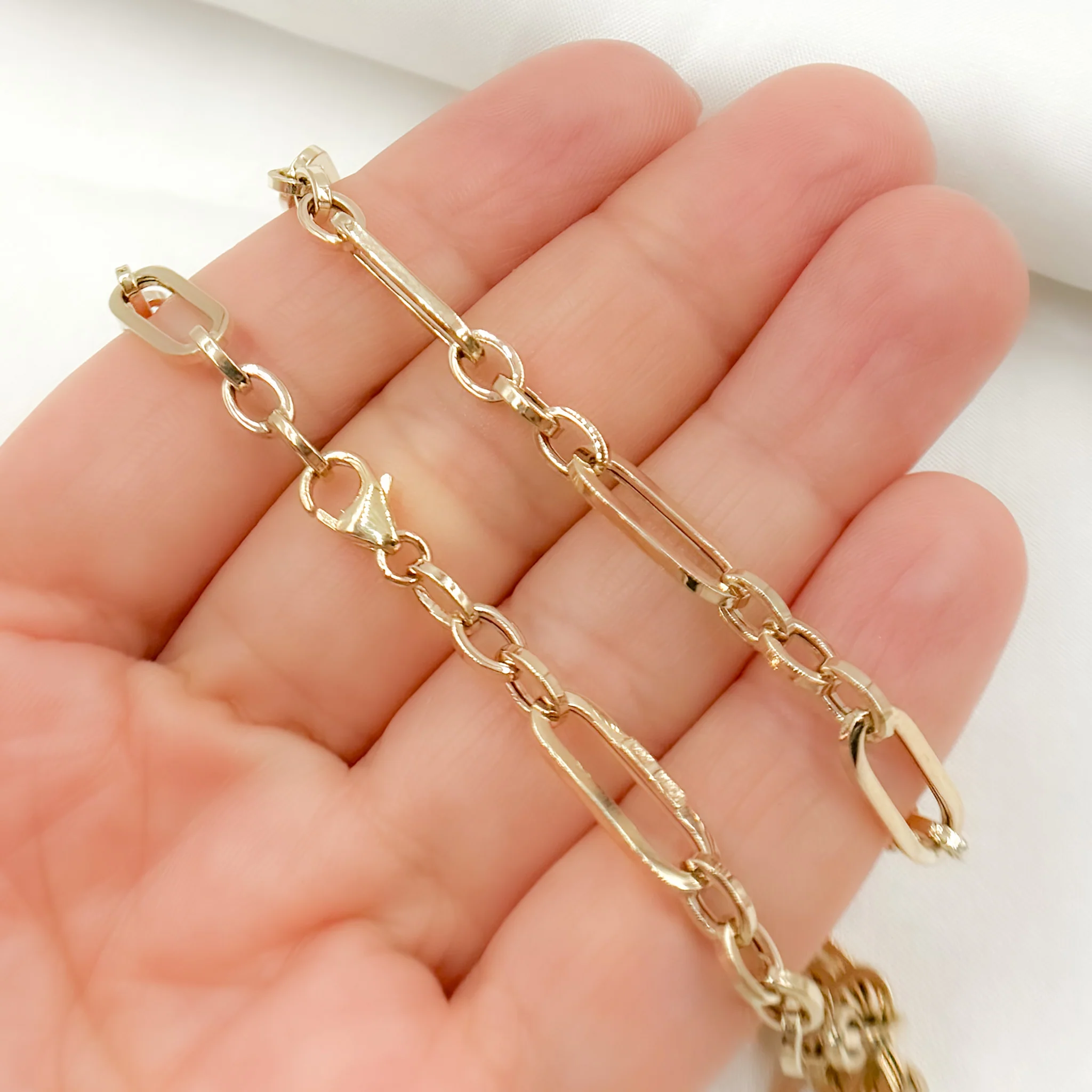 585/A060/G. 14K Solid Hollow Gold Flat Long & Short Oval Link Chain