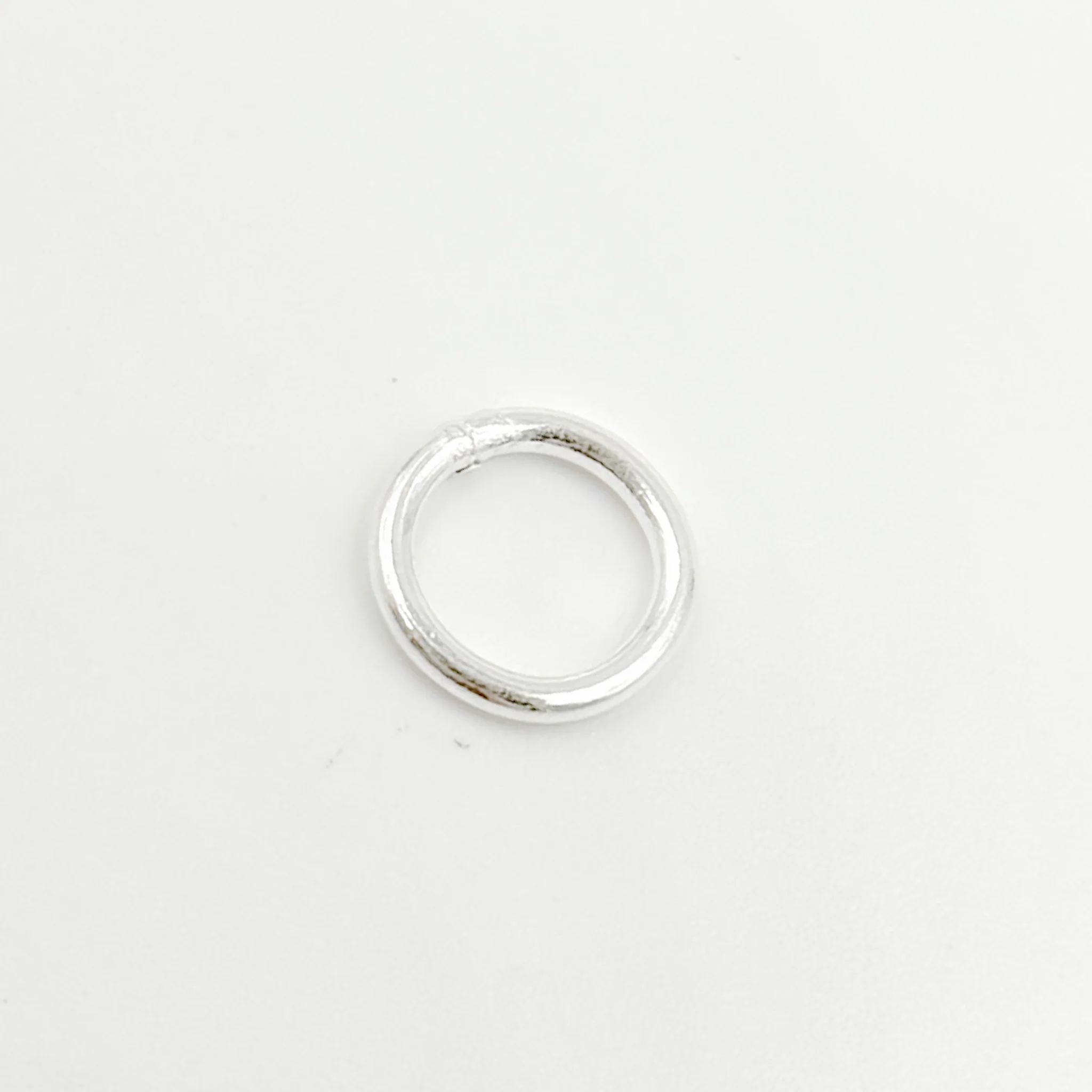 5004486C. 7MM 18Gauge White Sterling Silver Close Jump Ring - Image 2