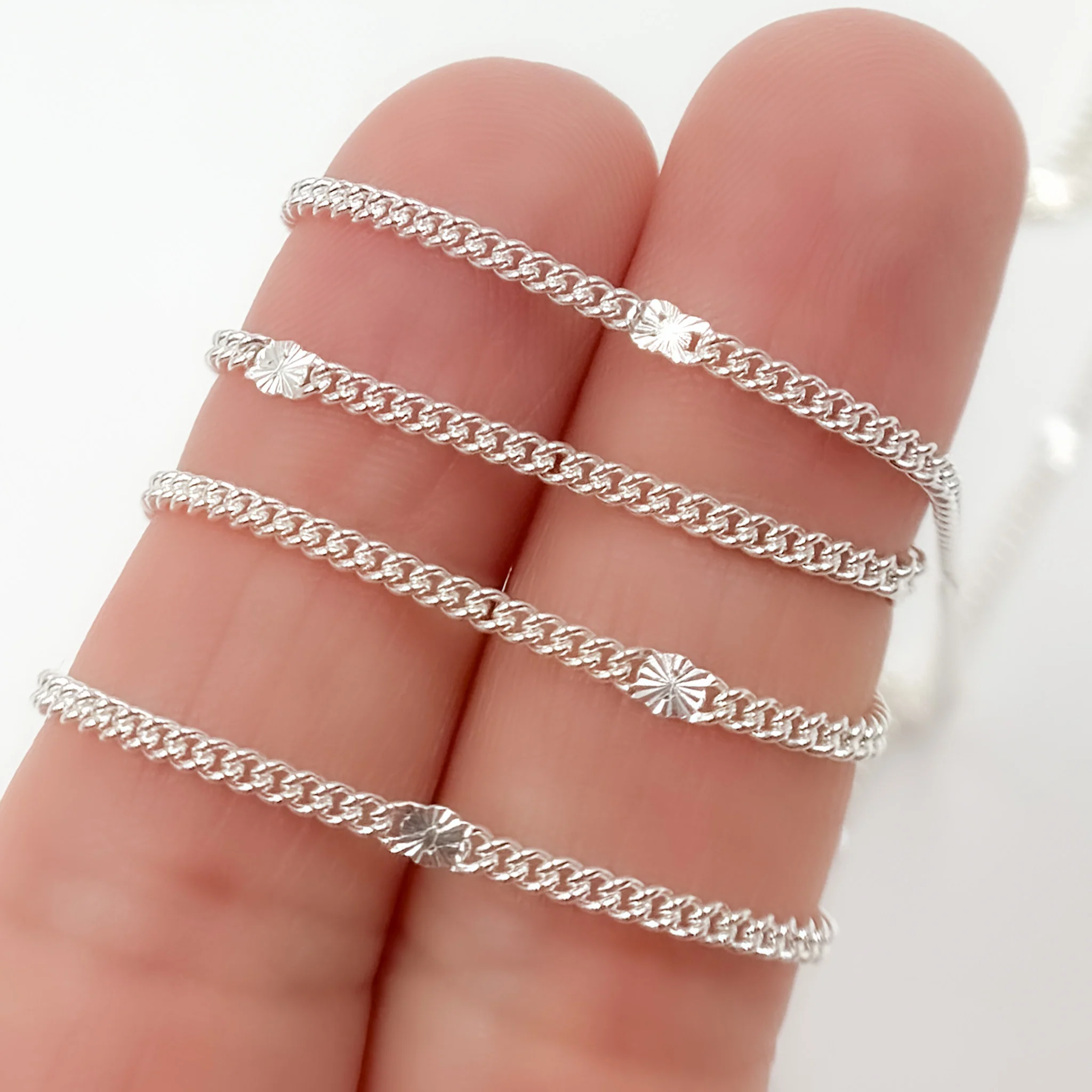67S1. Sterling Silver Curb and Diamond Cut Link Chain