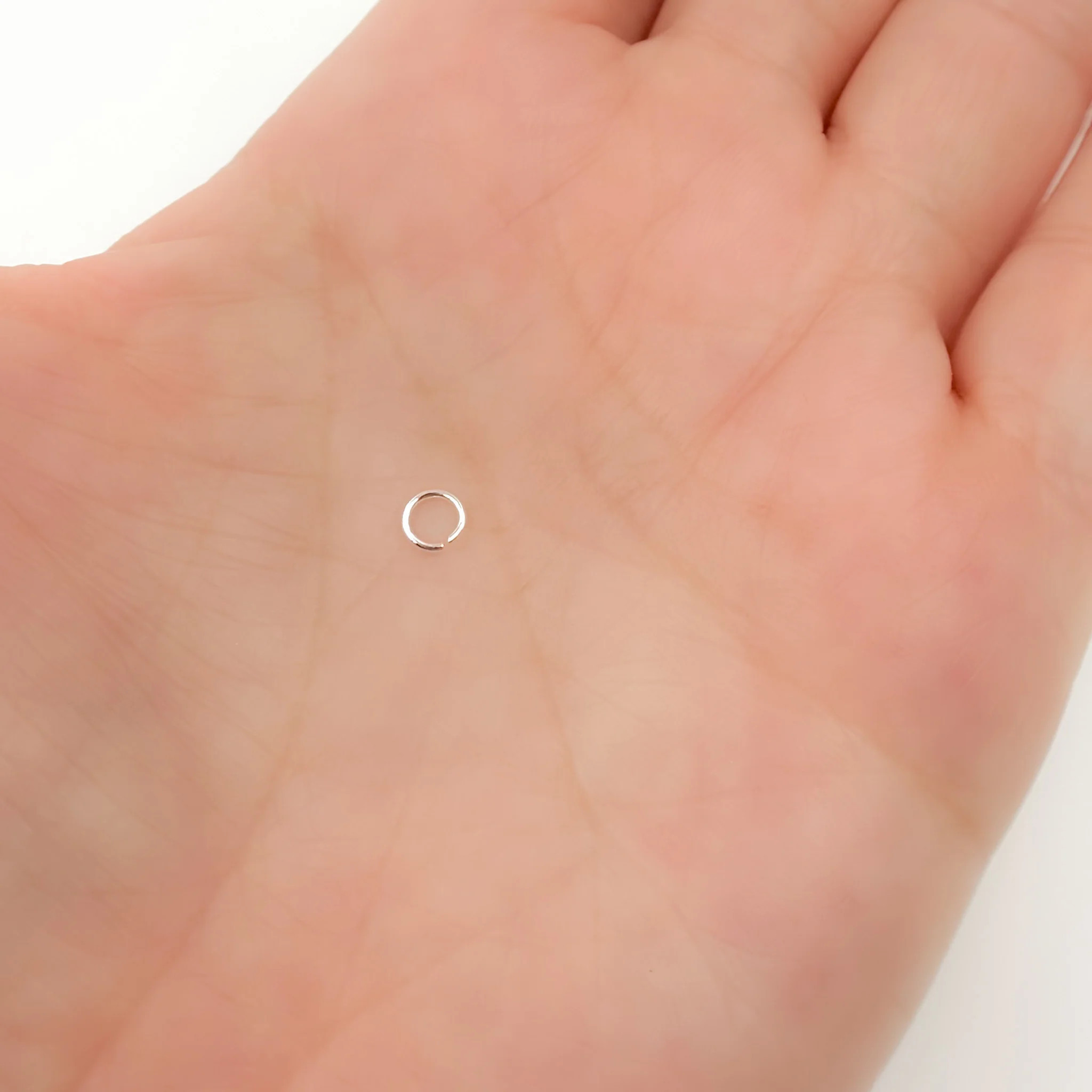 MFT060DE4. 4MM 22Gauge White Sterling Silver Open Jump Ring