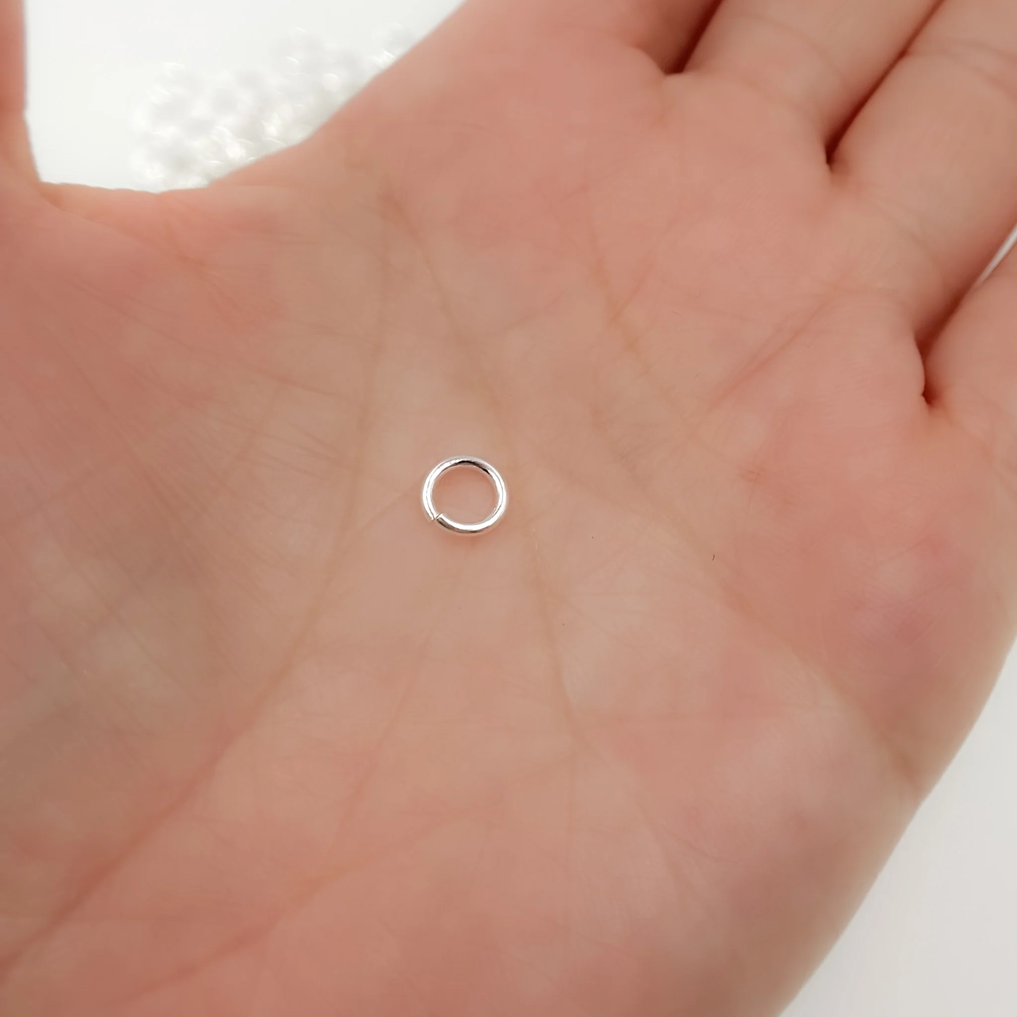 5004522. 6MM 18Gauge White Sterling Silver Open Jump Ring - Image 2