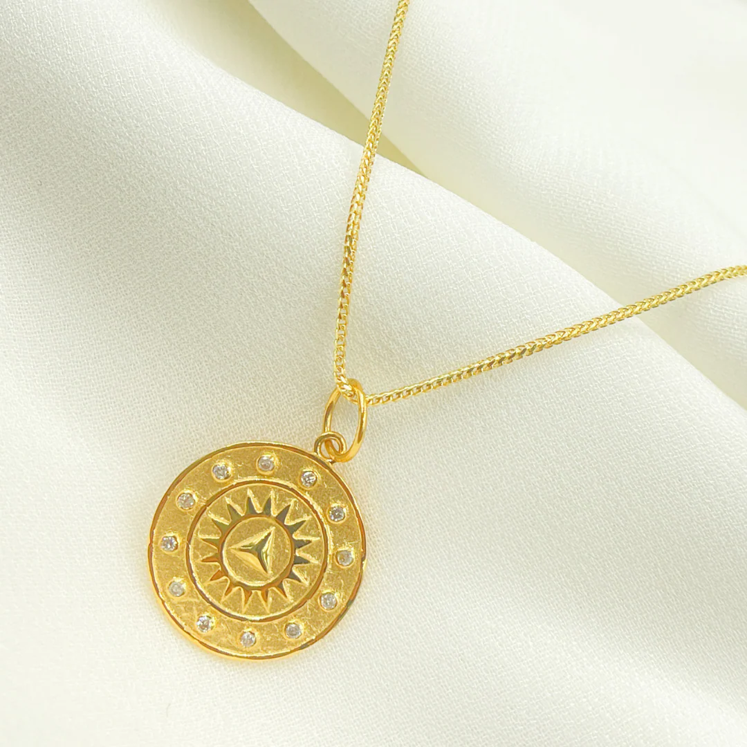14K Solid Gold with Diamonds Circle Shape Charm with Sun in the Center. GDP149