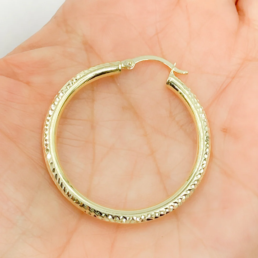 GER67. 14K Gold Hollow Hoop Earrings with Engraved Tornado Design - Image 3