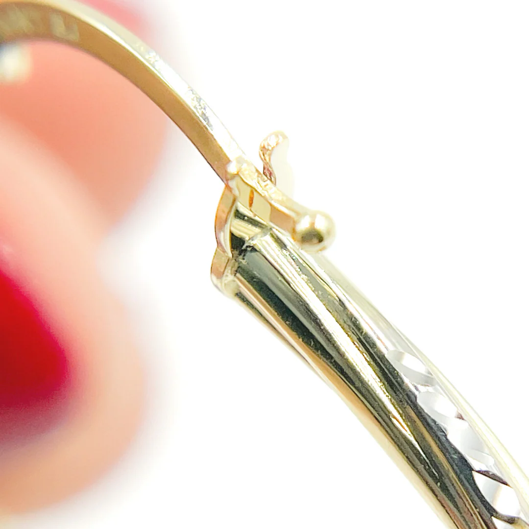 GER71. 14K Gold Hollow Hoop Earrings with Engraved Tornado Design - Image 4