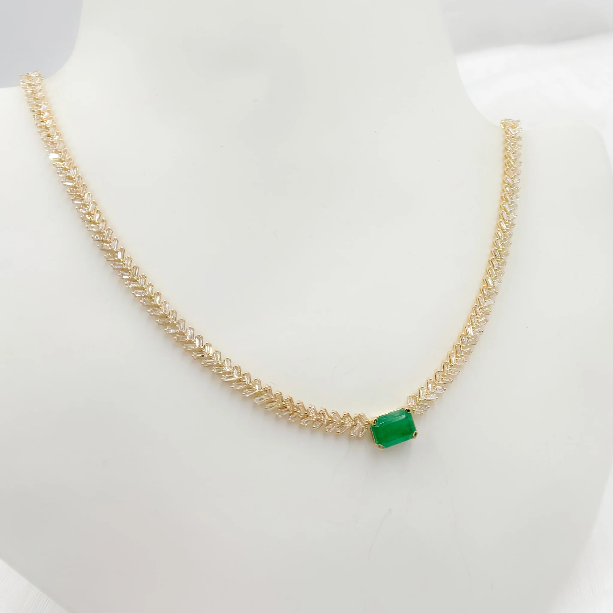 NK402201. 14K Solid Gold Baguette Diamond and Solitaire Emerald Necklace